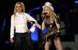 http://img196.imagevenue.com/loc527/th_79652_Celebutopia-Madonna_and_Britney_Spears_perform_together_during_Madonna7s_Sticky_and_Sweet_tour_in_Los_Angeles-02_122_527lo.JPG