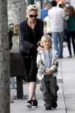 th_39894_Celebutopia-Sharon_Stone_his_the_streets_of_Los_Angeles_with_her_son-05_122_655lo.JPG