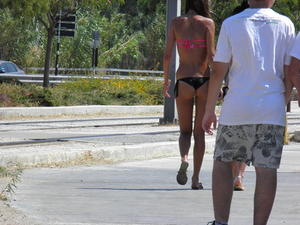 2 Young Bikini Greek Teens Teasing Boys In Athens Streetsc3elf52r4g.jpg